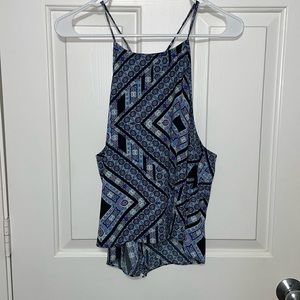 Blue aztec cropped women’s tank that features an open back